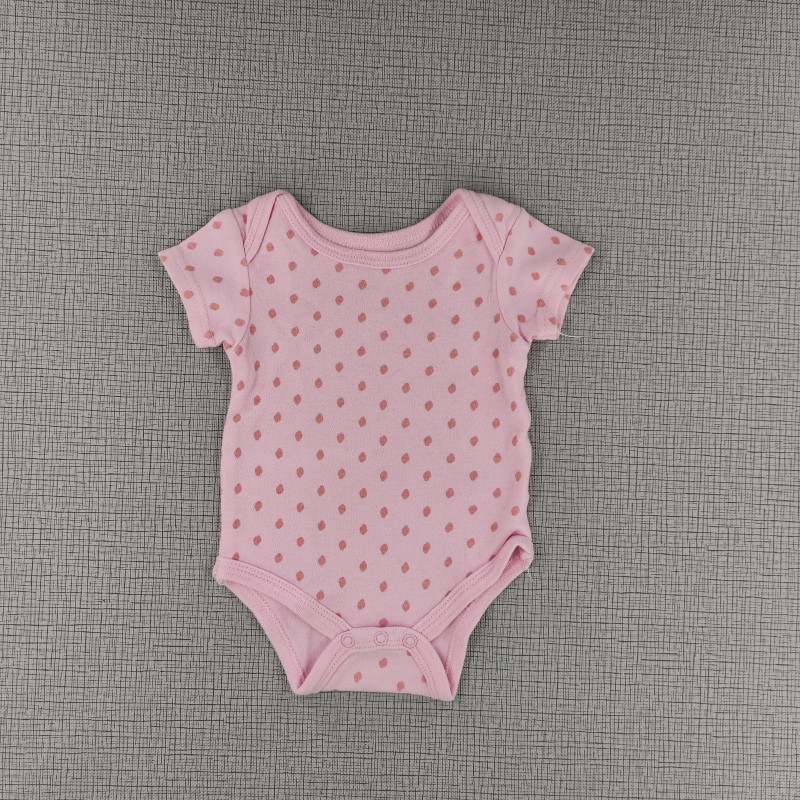 Body rosado con diseño de puntos