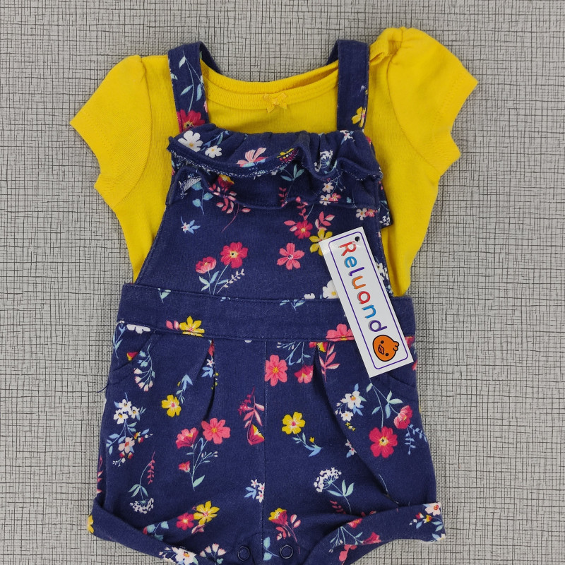Conjunto overol azul oscuro y blusa amarilla
